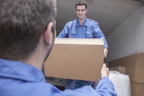 Professional movers assisting with a household move in Tooting